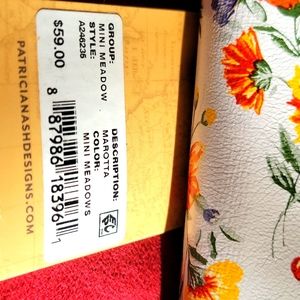 All leather wallet by Patricia Nash